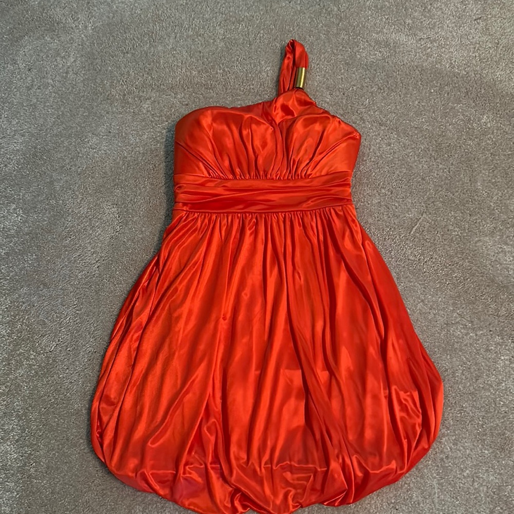 XOXO Bright Orange One Shoulder Bubble Dress with Gold Tone slinky on strap
